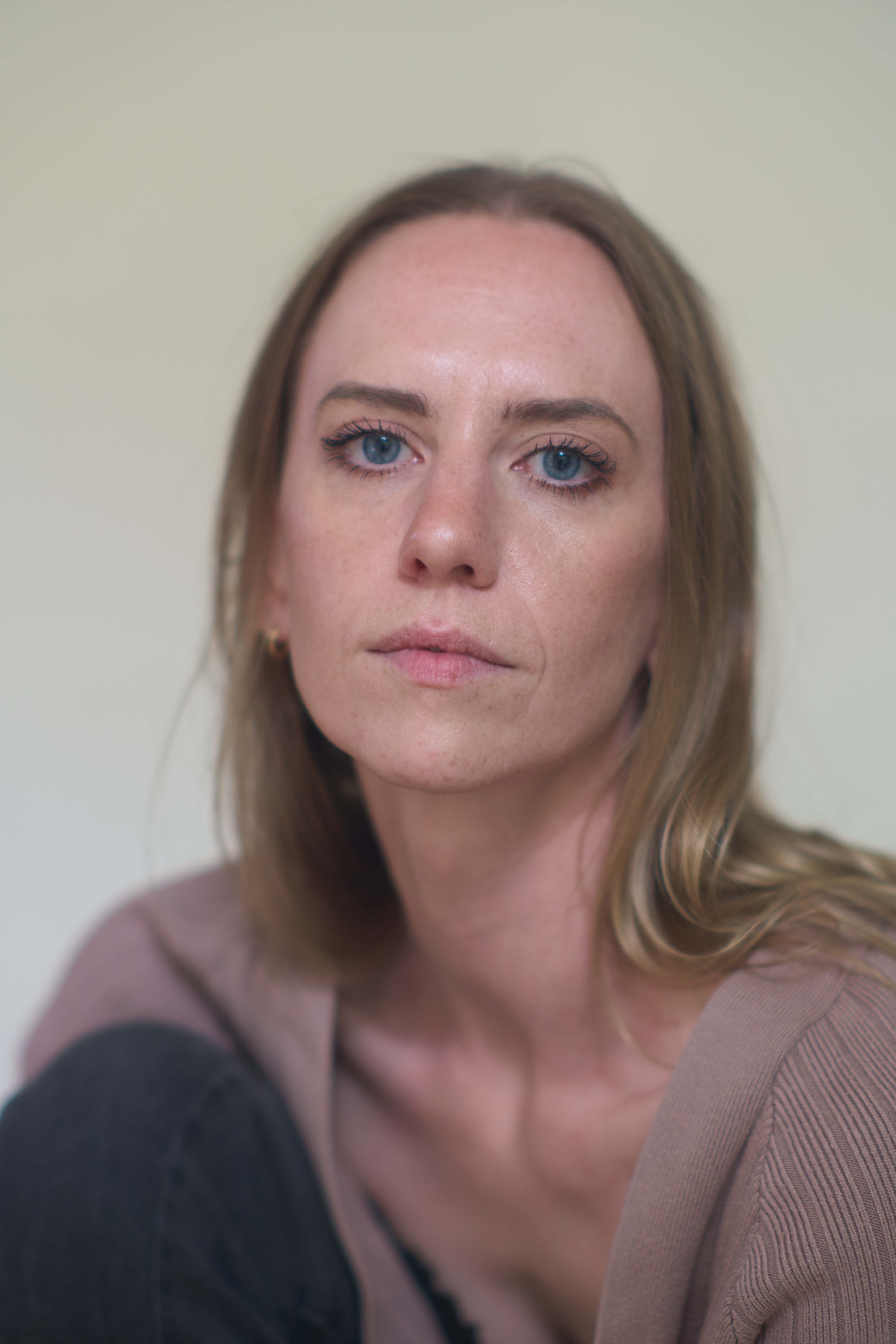 Natural actor headshot portrait of a woman with blue eyes, photographed in Charlotte