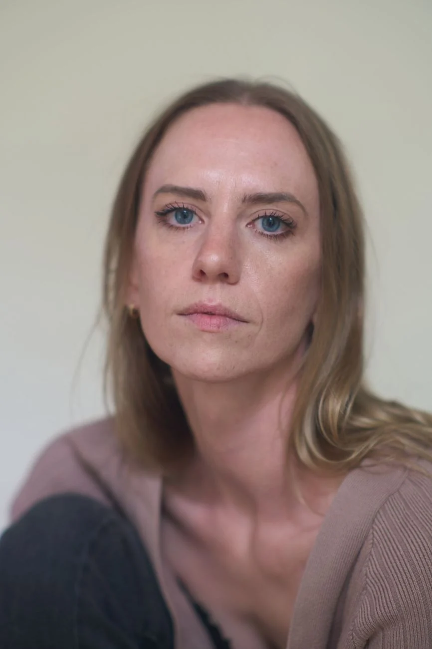 Natural-light portrait of a woman with blue eyes